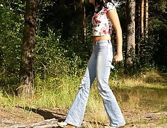Beautiful teen peeing in the forest
