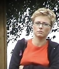 Unsuspecting mama in glasses empties her bladder